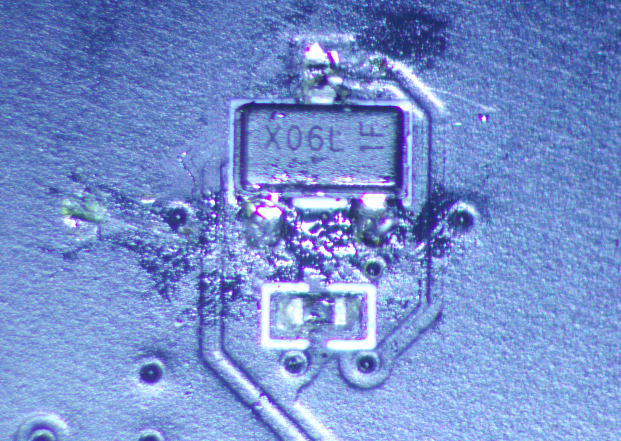 Close-up photo of the mysterious SOT-23-3 component on the PCIe adapter board
